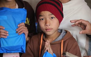 HCC Annual Report Kid Praying
