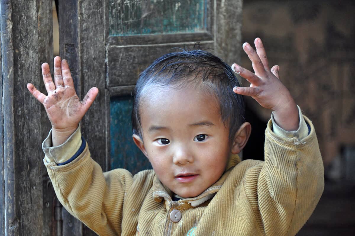 HCC Nepal Scenes of Nepal Boy with Arms Up 4